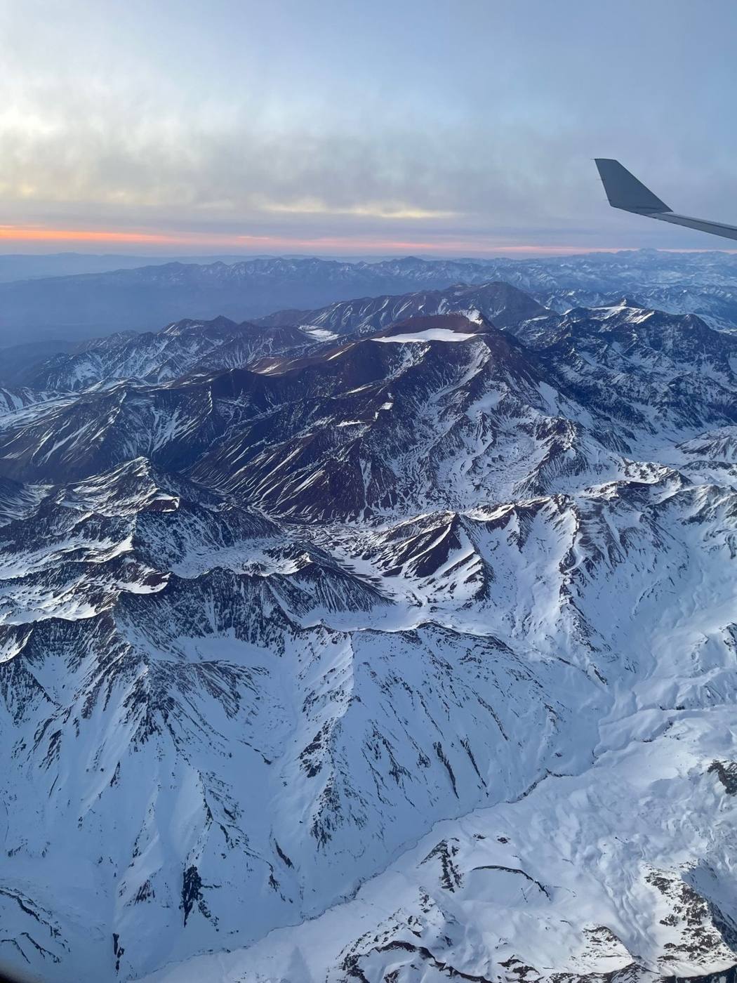 Aerial view of the snowy Andes at dusk