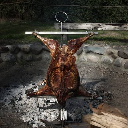 Lamb al palo over the coals