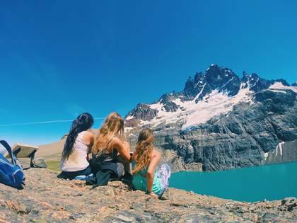 Friends at a turquoise glacial lagoon