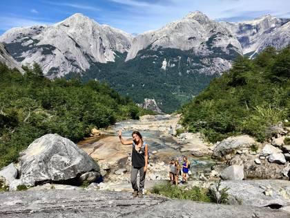 Hikers among the granite boulders